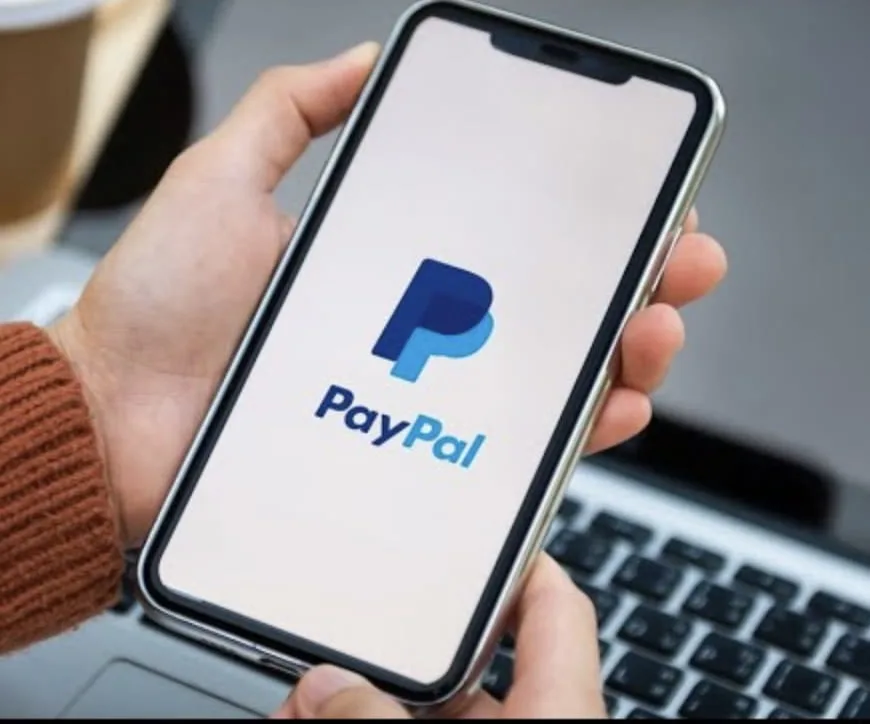 Two people in suits shaking hands on a referral partnership